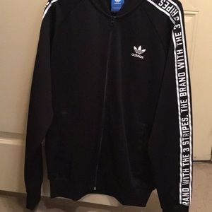 the brand with the three stripes jacket
